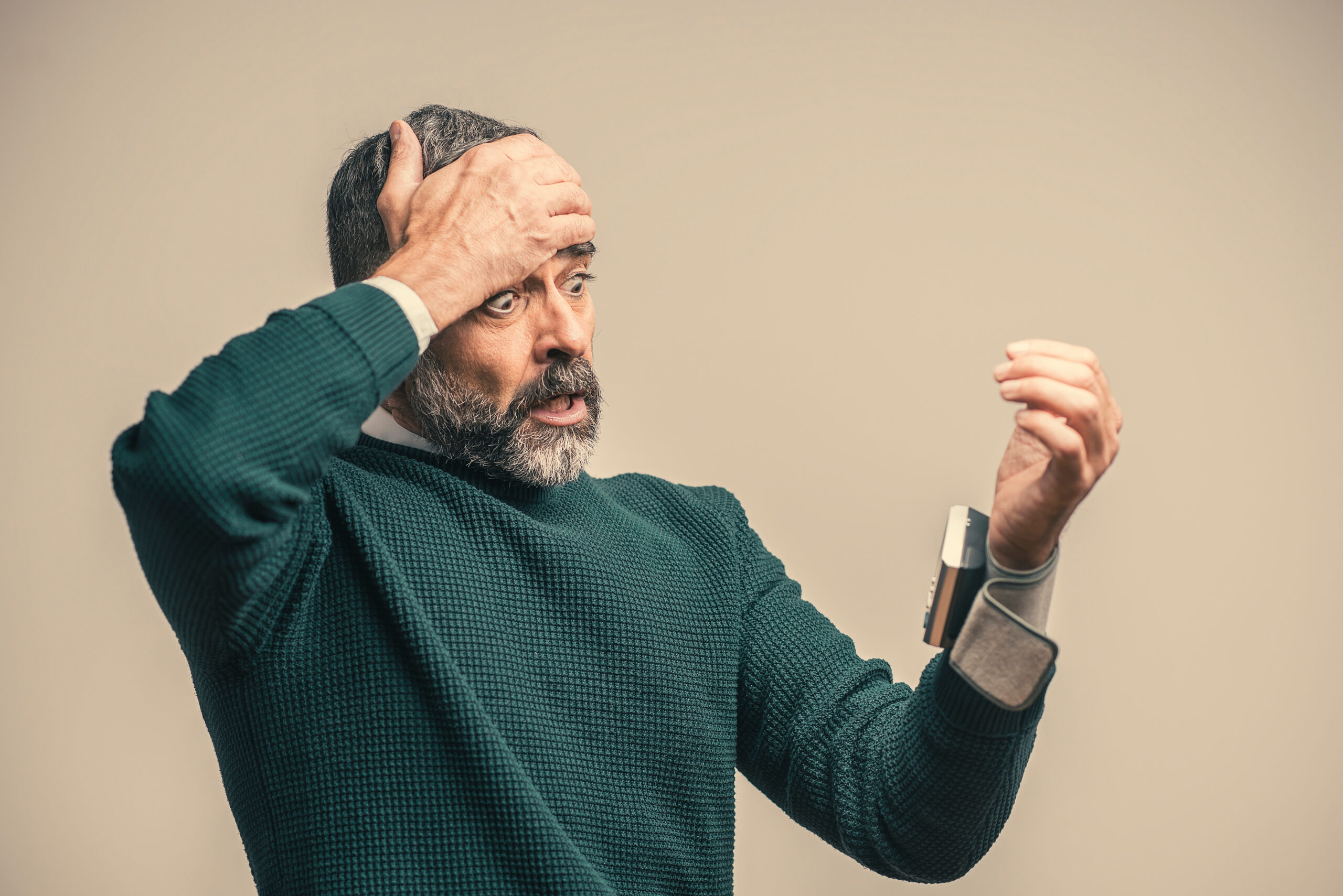 Senior man shocked with his blood pressure result