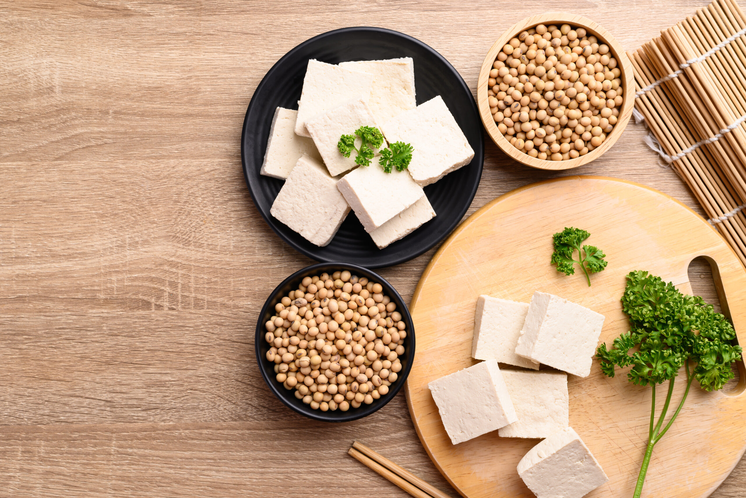 Homemade tofu with soybean seed, Vegan food ingredients in Asian cuisine, Plant based, Table top view